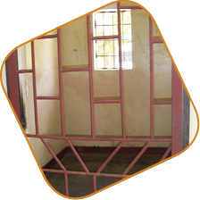 Photo: Seclusion room at Kabwe psychiatric unit (left) and open seclusion room at Ndola with a man under observation (right), 24 October 2012. © MDAC.